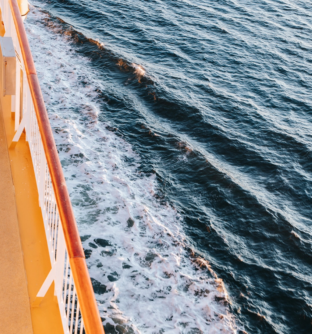 Side of a ship with water below